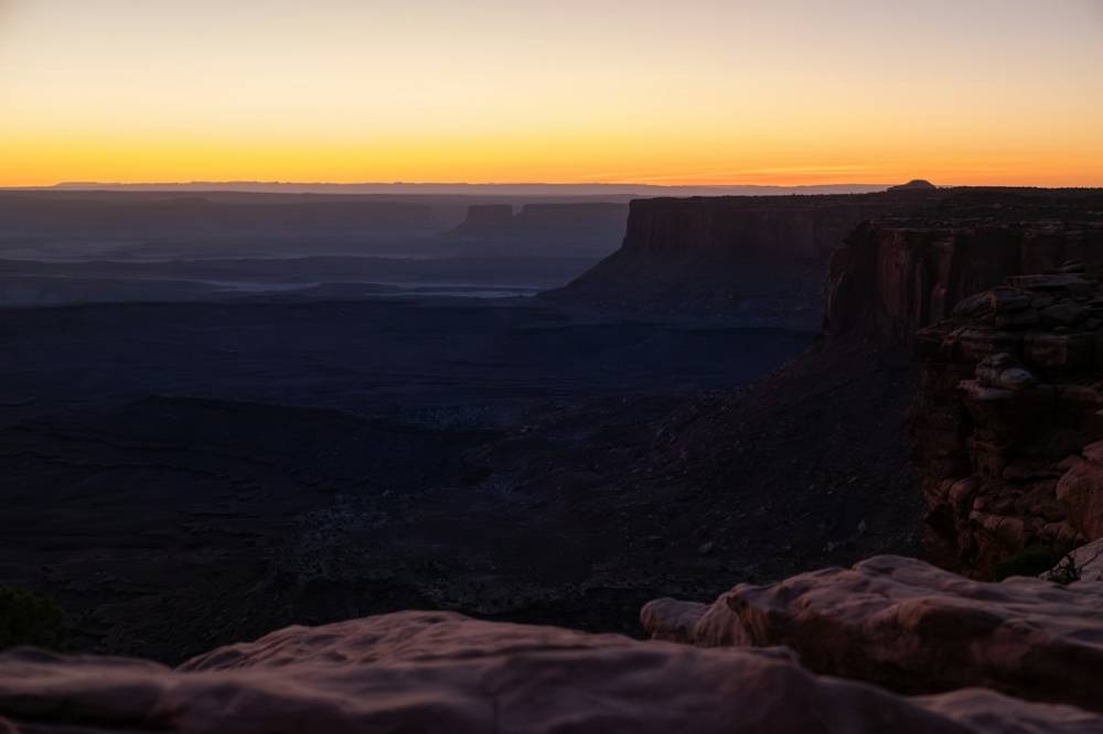 Dawn over a deep desert canyon